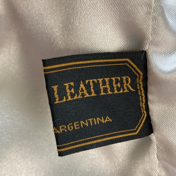 White Leather and silver grommet size medium jacket. Made in Argentina - Picture 9 of 11